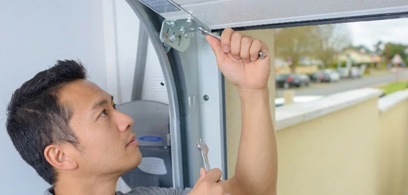Garage door tune-up and preventive maintenance service by Charleston SC technician